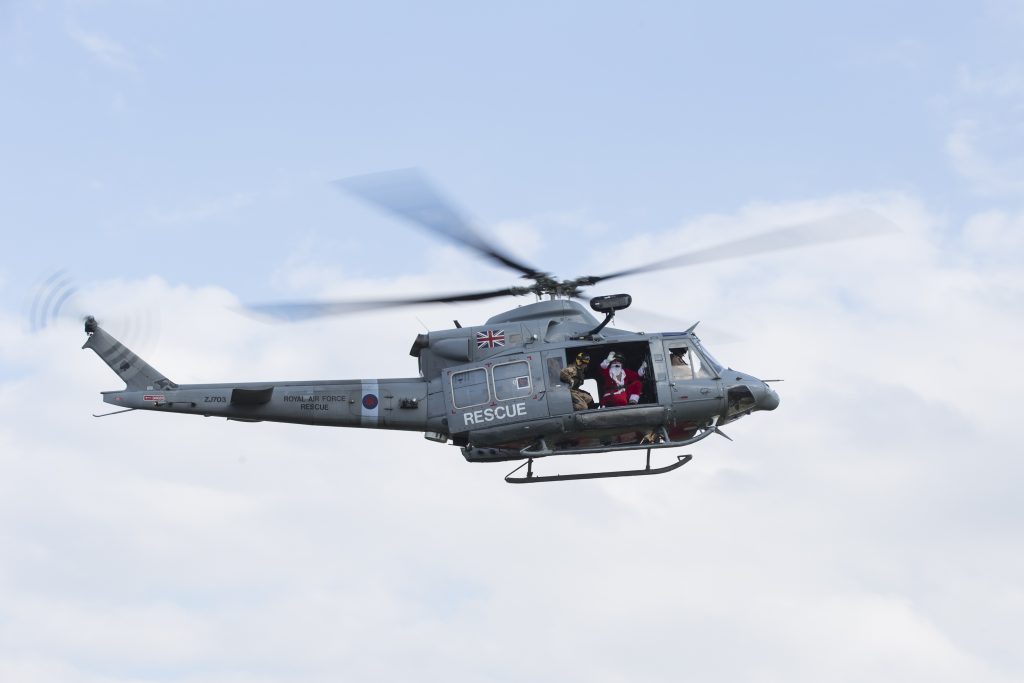 Santa Claus arrives at RAF Akrotiri by 84 Sqn Helcopter and is greeted by children from RAF Akrotiri Primary School. 12 December 2016 RAF Akrotiri - Cyprus
